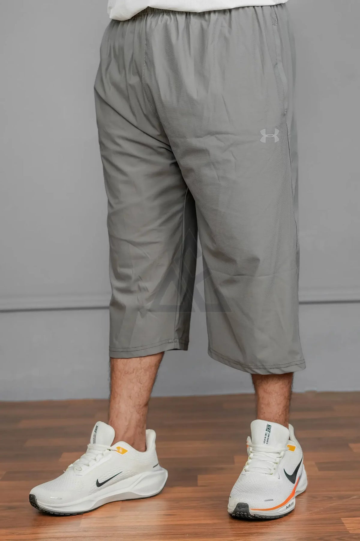 UA 3 Qtr Drifit Short T12 - Grey