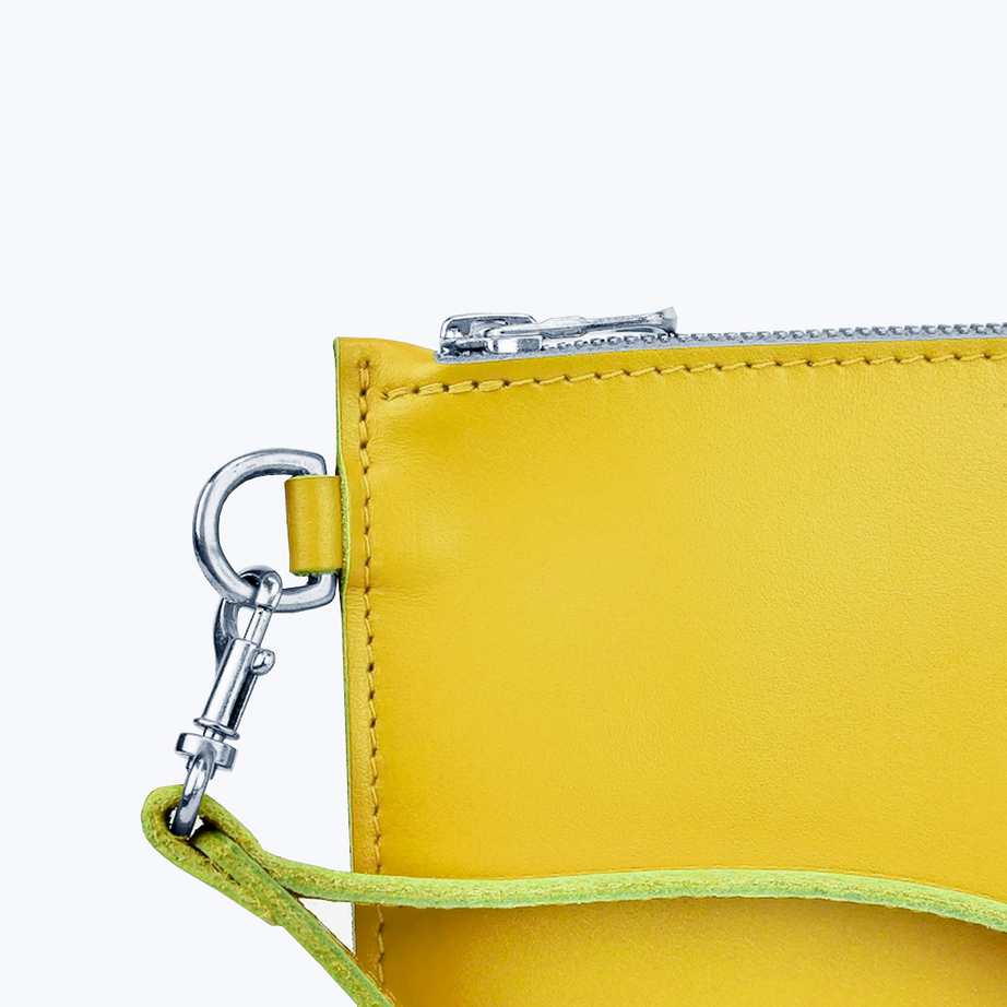 Clutch with wrist strap