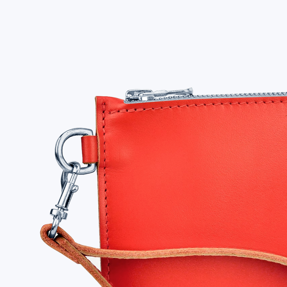 Clutch with wrist strap