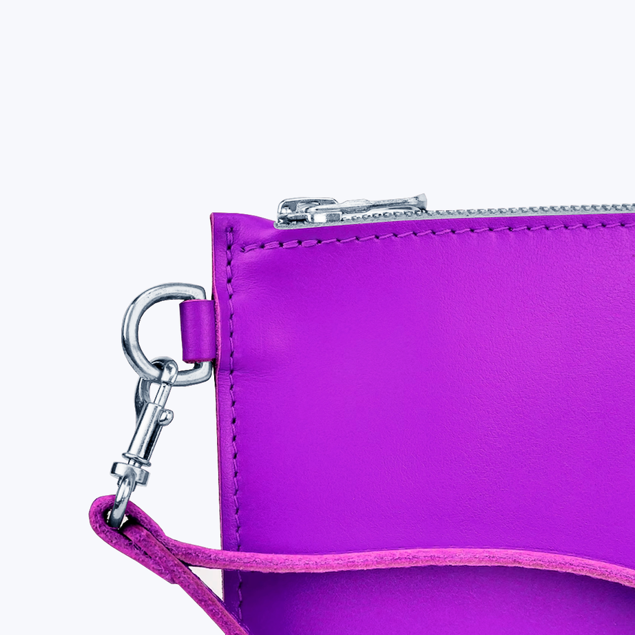 Clutch with wrist strap