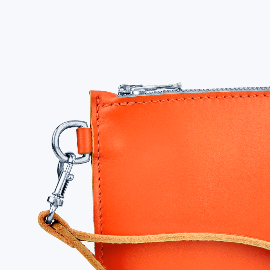 Clutch with wrist strap