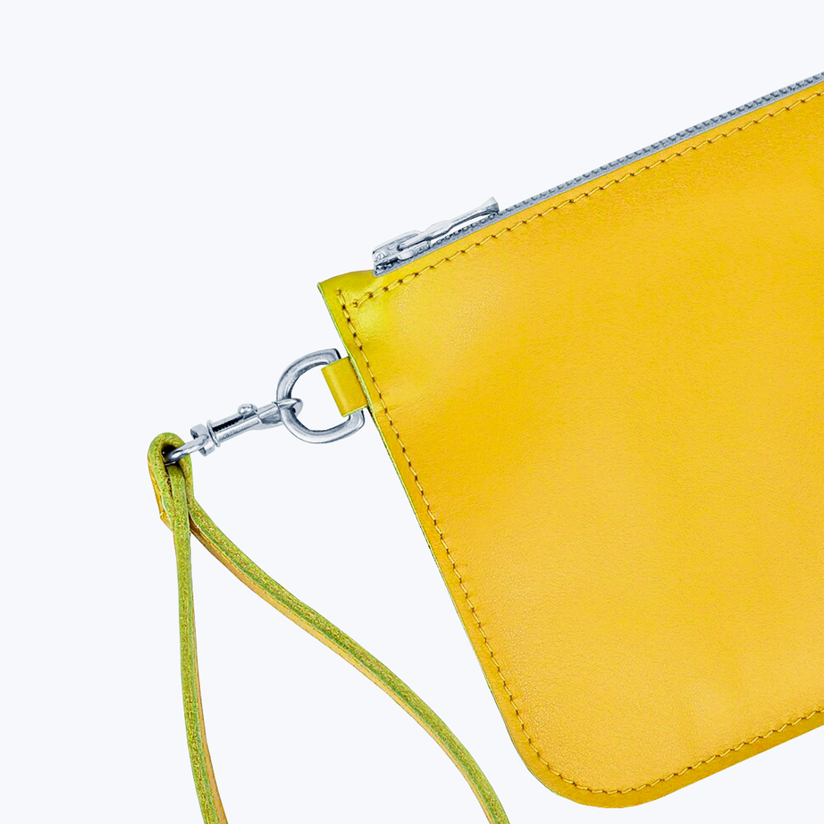 Clutch with wrist strap