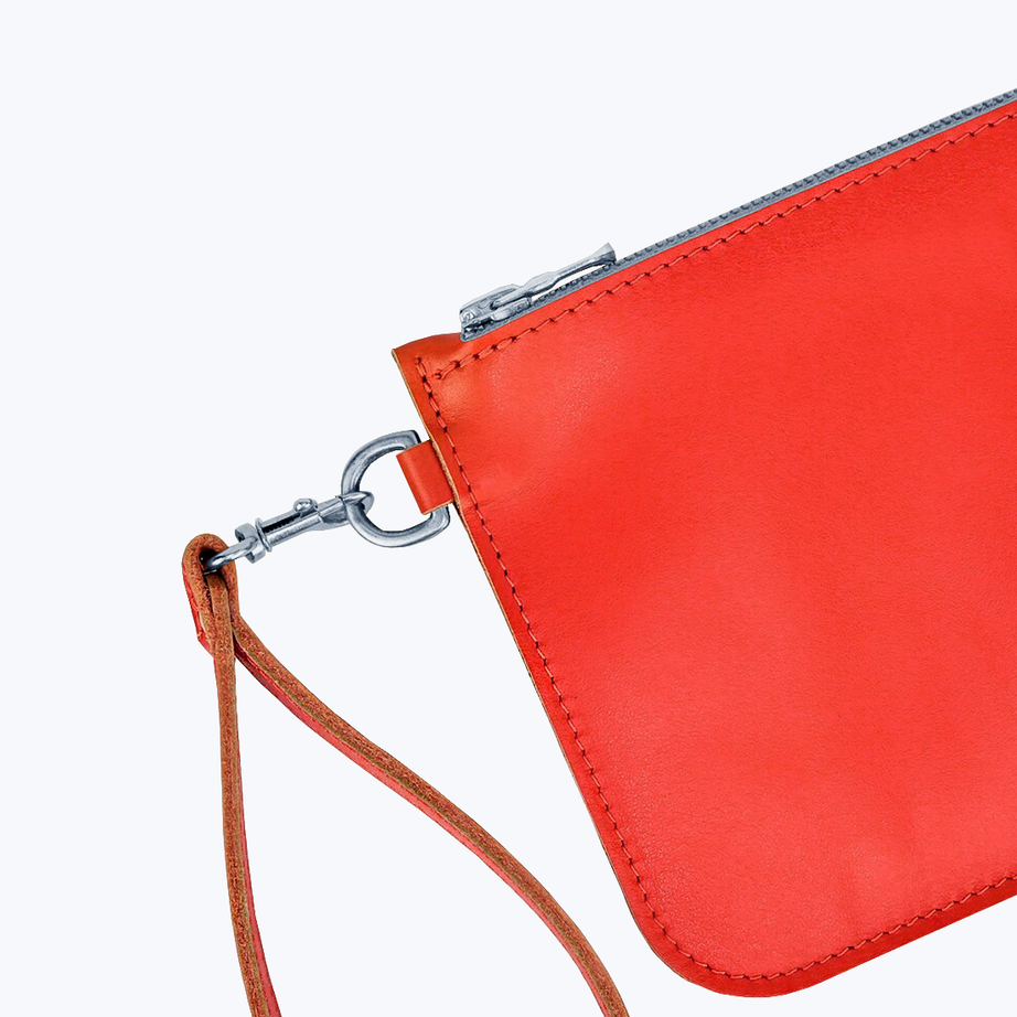Clutch with wrist strap